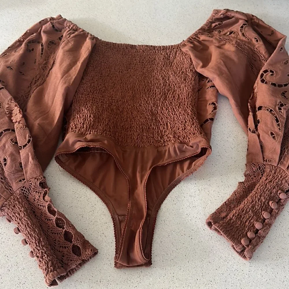 NWOT Free People Regina Bodysuit Top Thong Eyelet Balloon Sleeves Smocked Retro